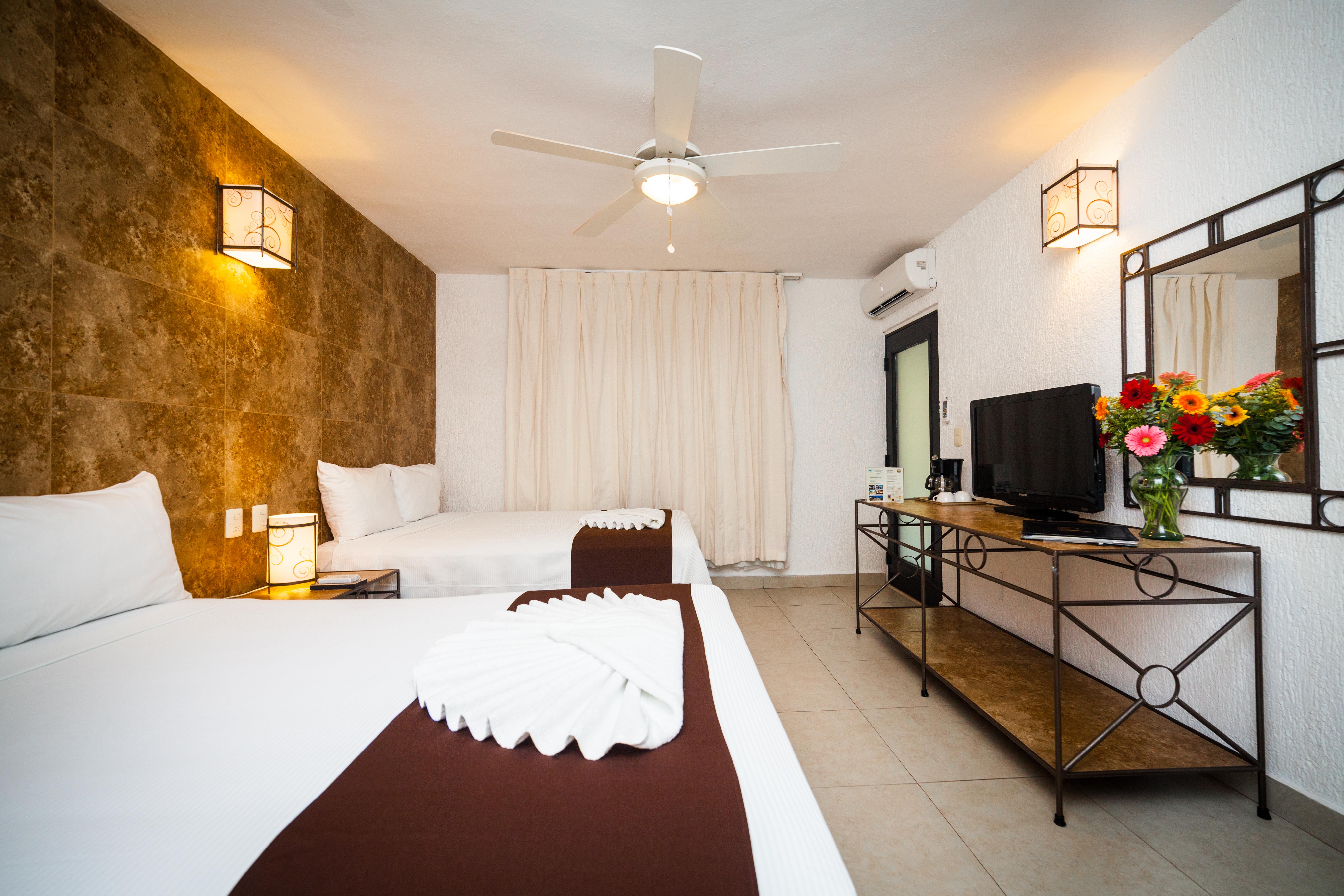 Tukan Hotel Playa Del Carmen Esterno foto