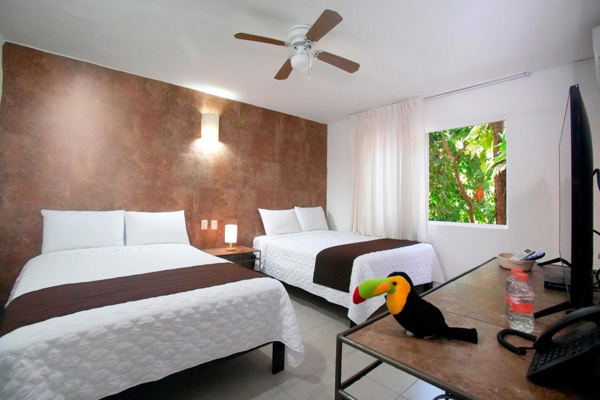 Tukan Hotel Playa Del Carmen Esterno foto