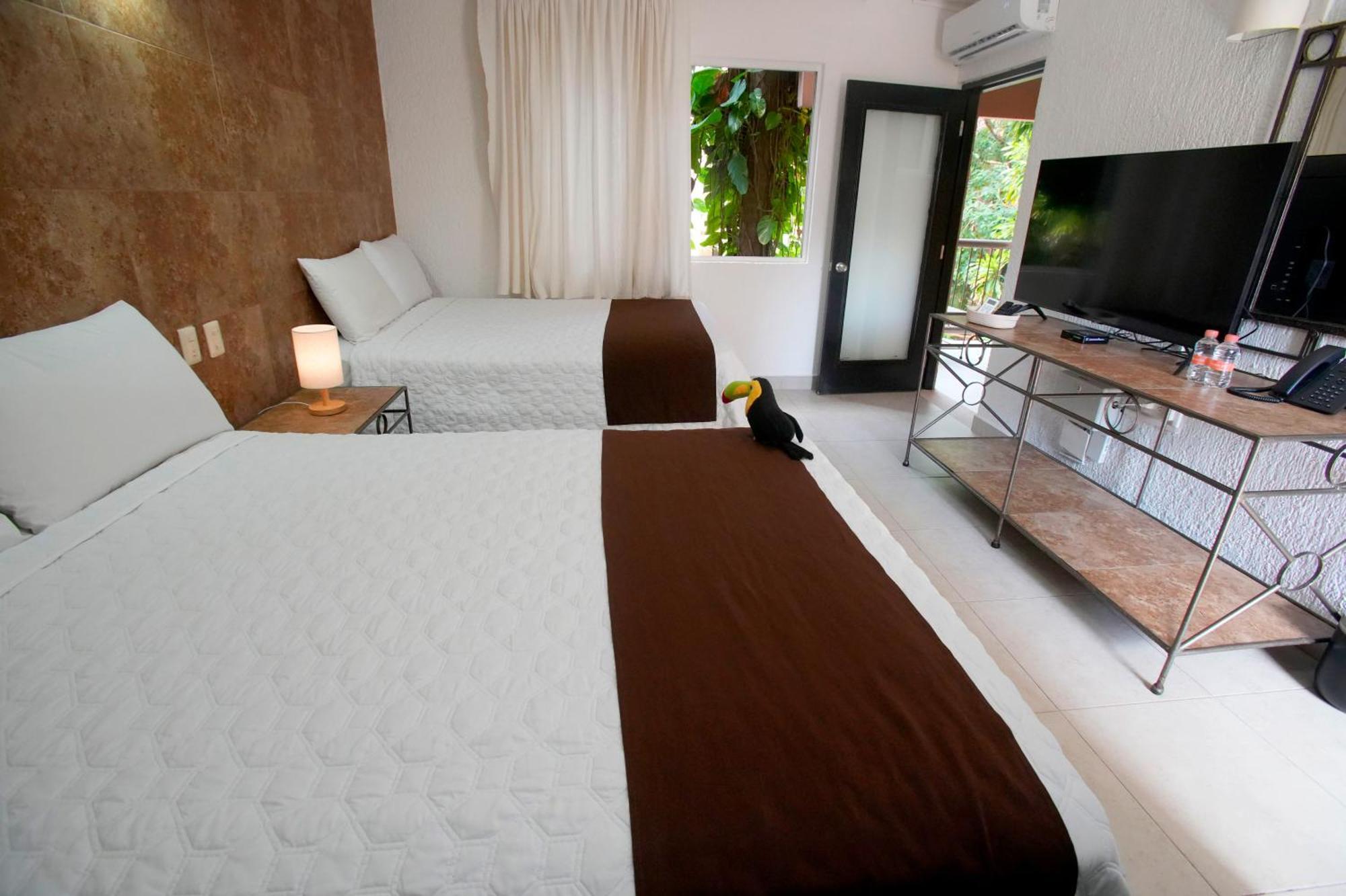 Tukan Hotel Playa Del Carmen Esterno foto